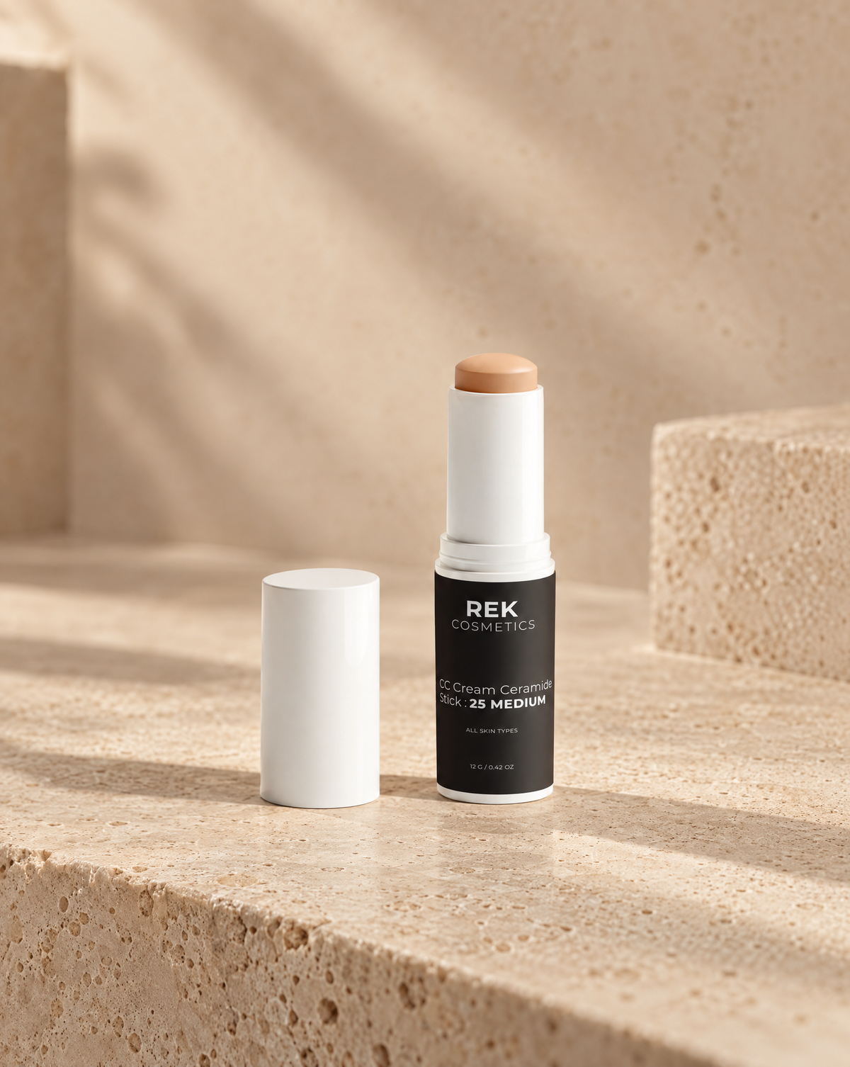 REK Ceramide CC Cream Stick 25 Medium — luxury studio product shot